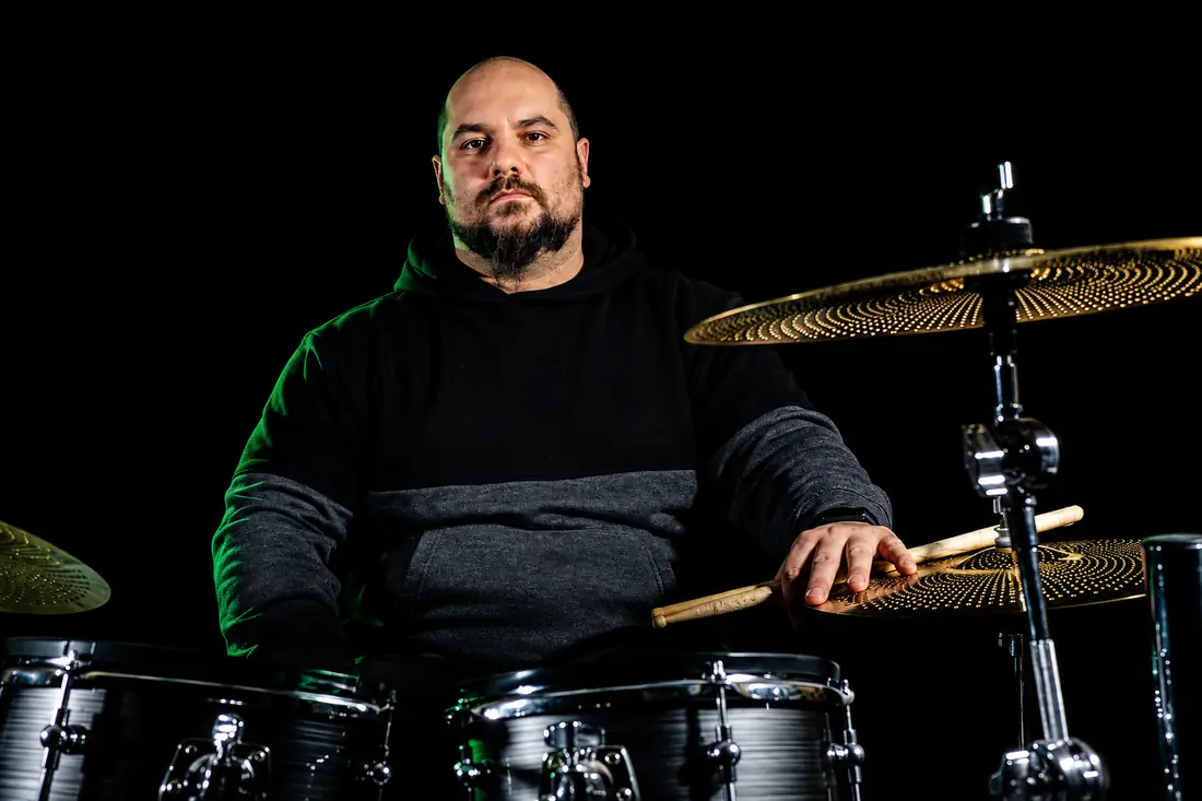 Rudy Mariani at the drum kit, studio portrait